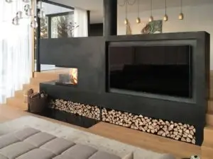 Minimalistischer Kaminofen von Mandl & Bauer mit Fernseher