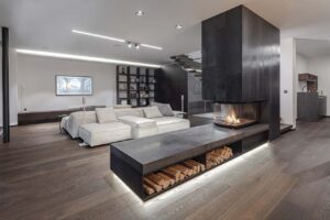 Kaminofen von Mandl & Bauer in einem Wohnzimmer